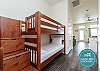 Twin size bunk beds off the hallway 