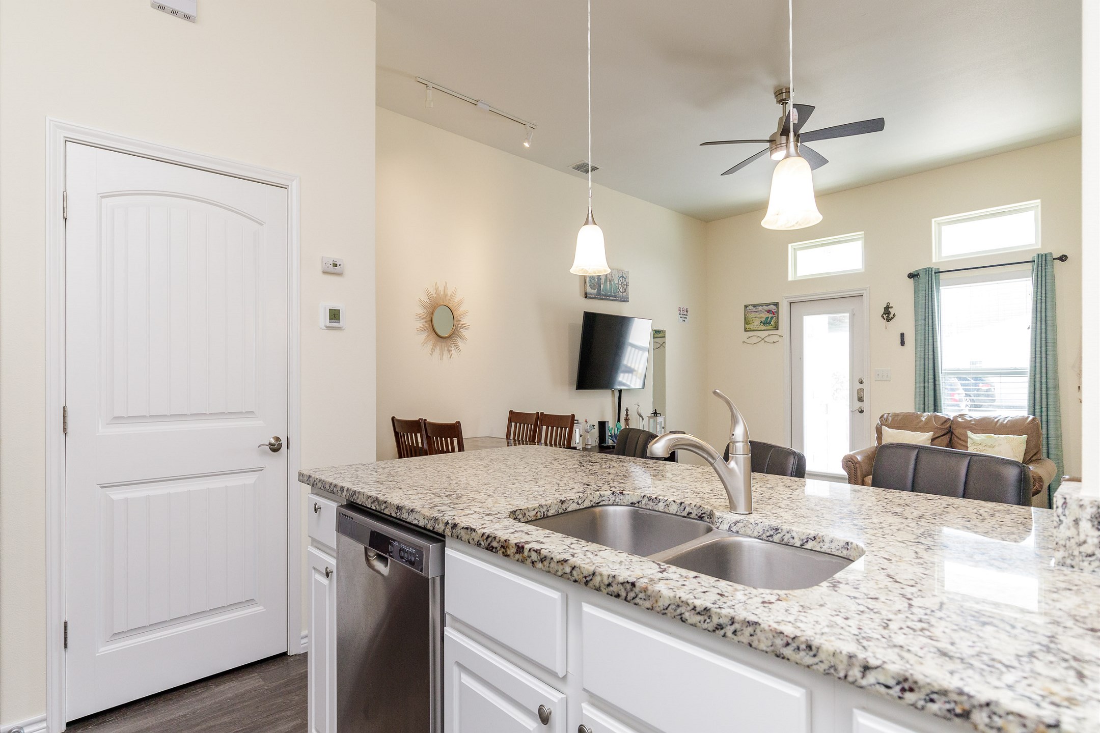 Coffee maker, toaster, cookware, dinnerware, and other kitchen essentials provided