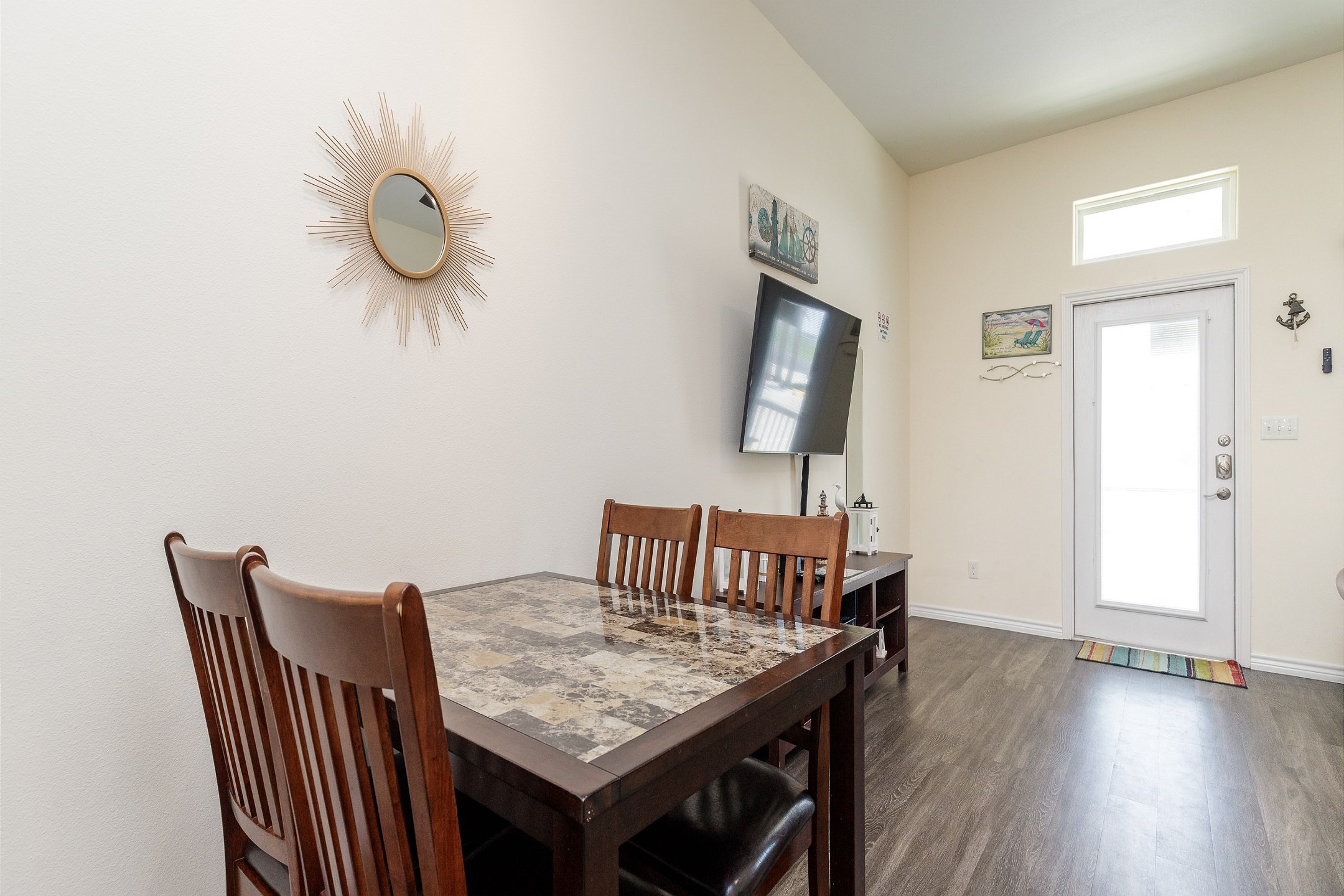 Modern dining space with easy access to the gourmet kitchen
