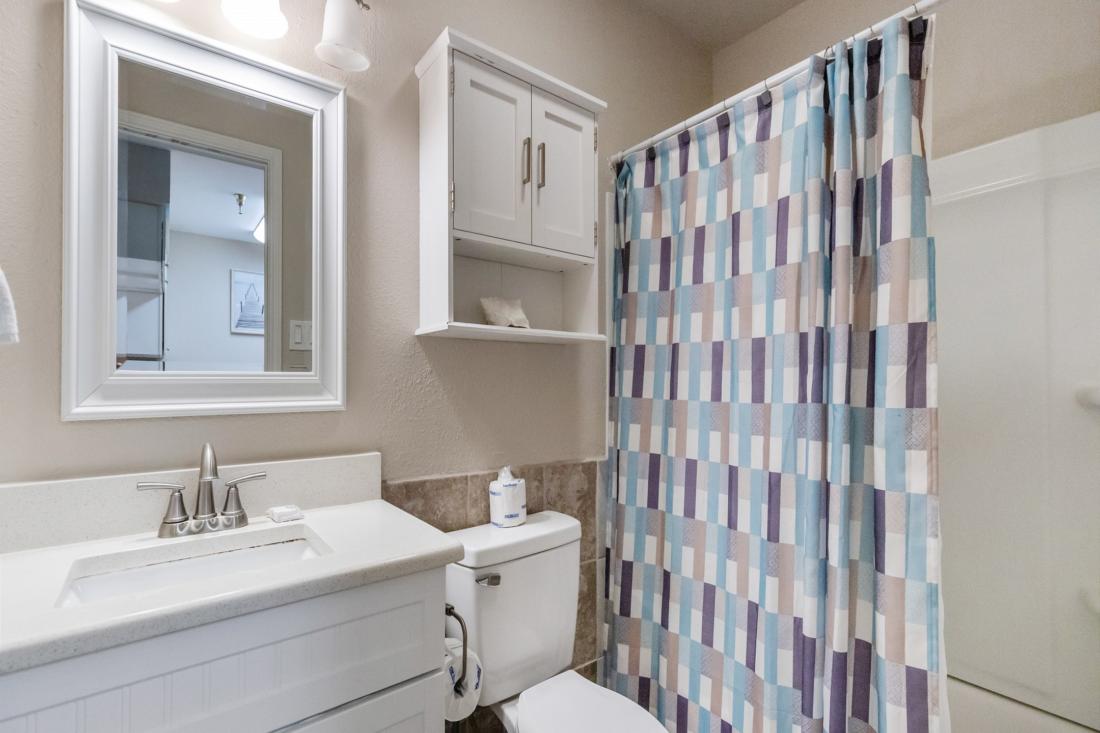 Bathroom on the first floor with tub and shower