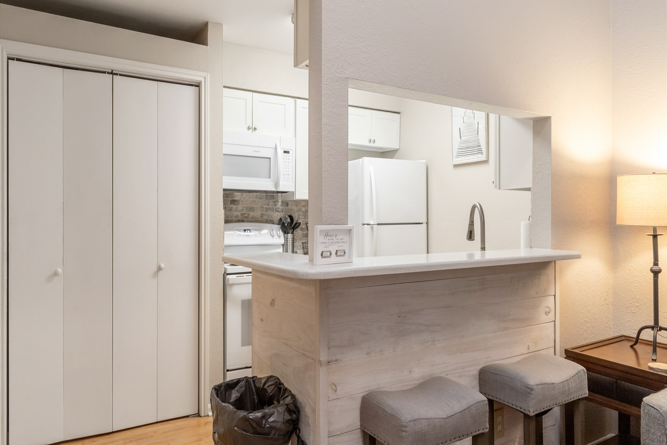 Breakfast bar with seating for two that over looks the kitchen
