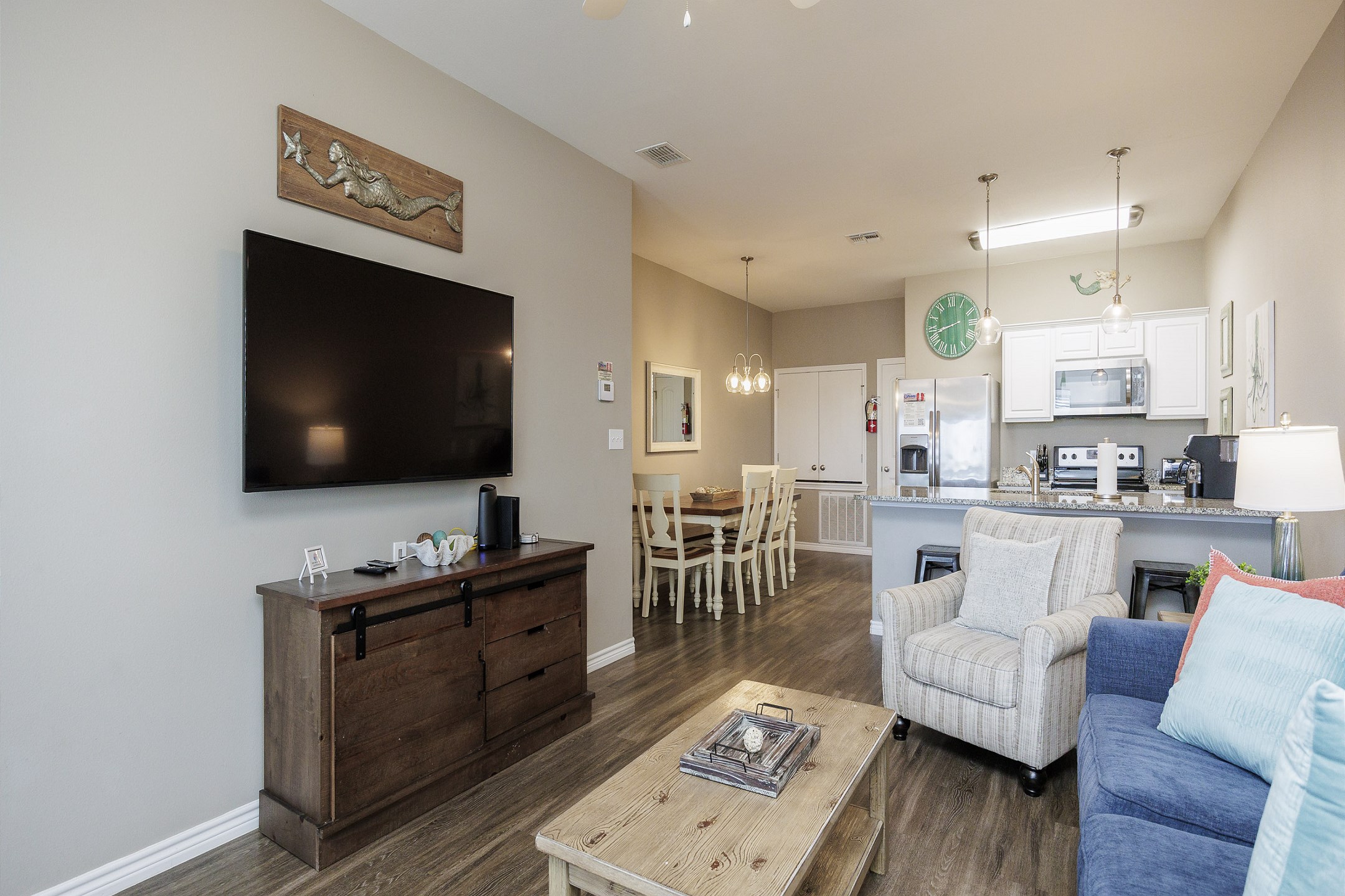 Charming living space with cozy furniture and updated features