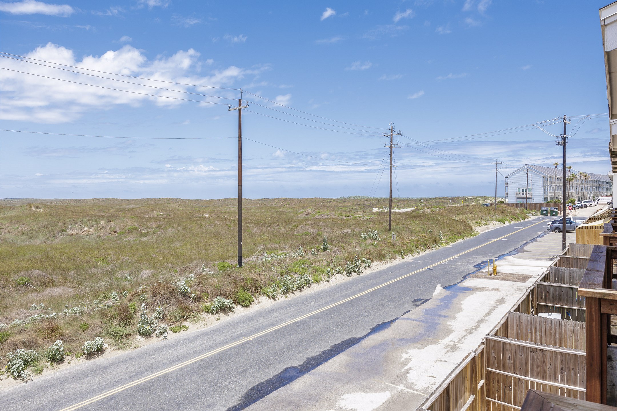 Enjoy a great view of the dunes and beach in the distance, while listening to the waves crash onshore 