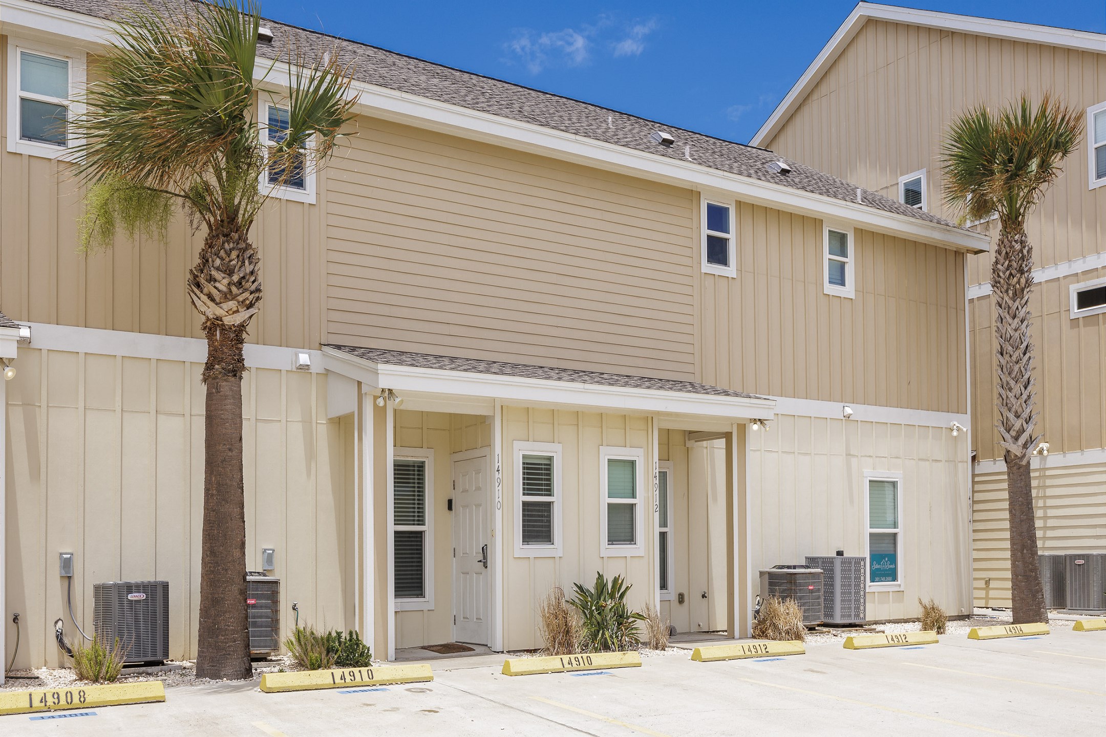 Front entrance to property with two reserved parking spots