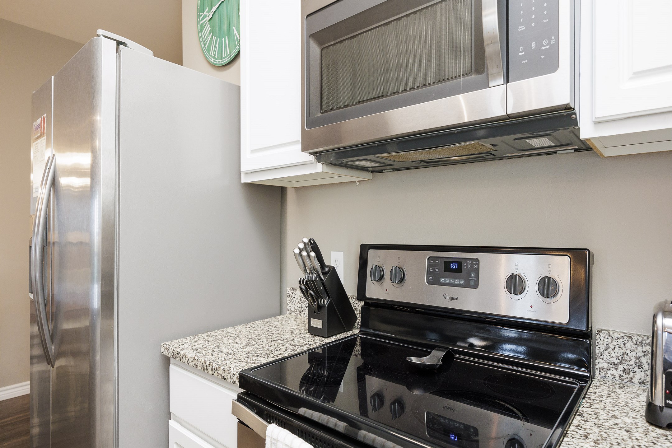 Great kitchen space with coffee maker, toaster, cookware, dinnerware, and other kitchen essentials provided