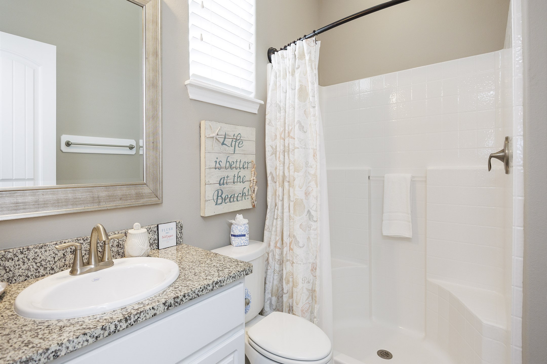 Guest bathroom on the second floor with walk in shower