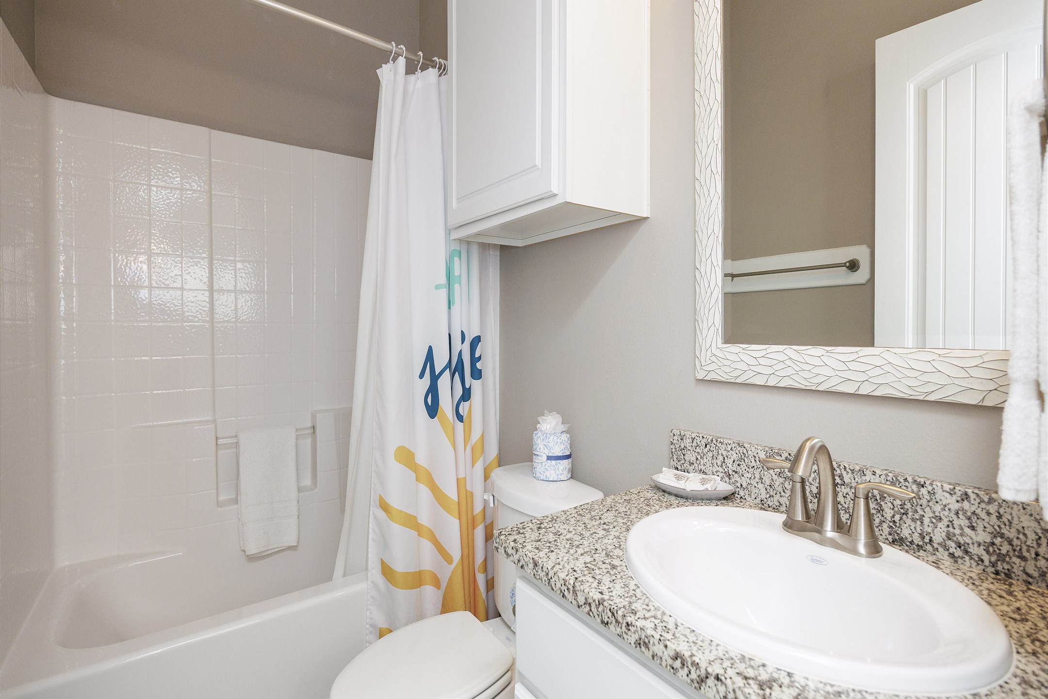 Guest bathroom on the first floor with tub and shower combo