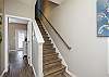 Stairwell to the second floor living dining and kitchen area. 