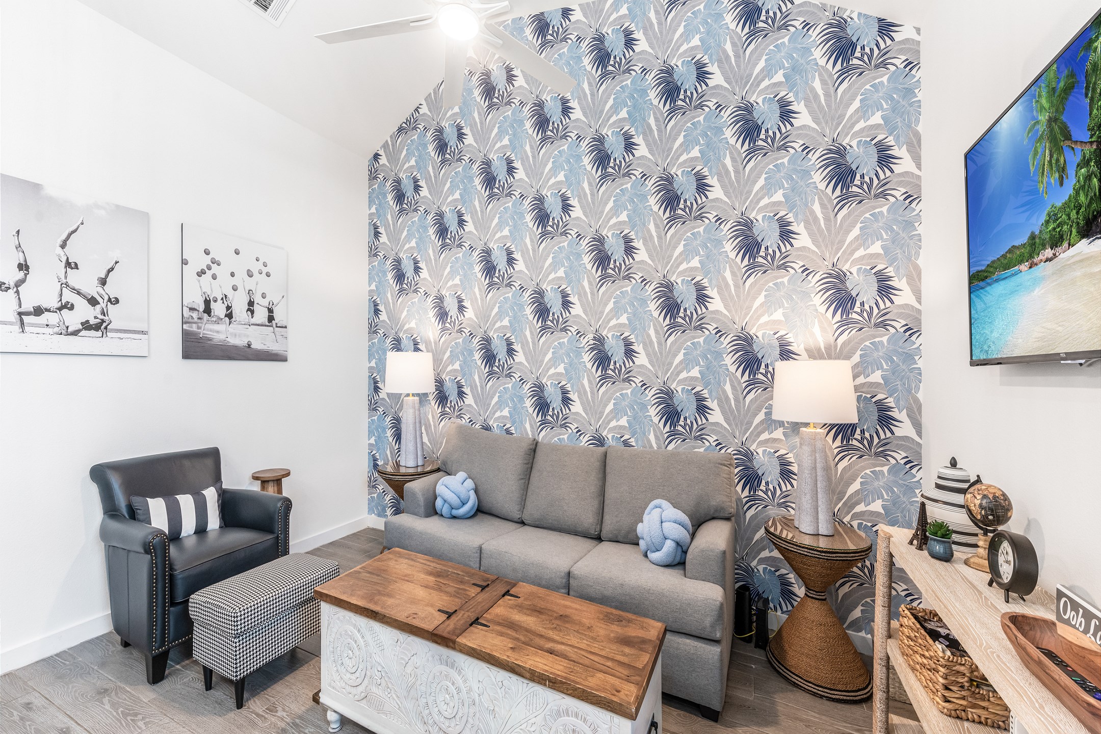 Newly updated living area with queen size sleeper sofa, new accent chair and flat screen TV