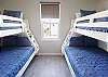 Fourth bedroom with two sets of twin over full bunk beds 