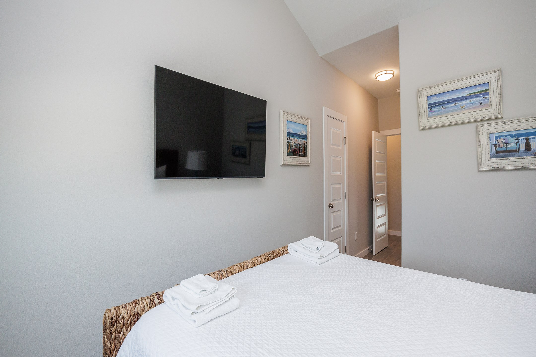 Third bedroom on the second floor with queen size bed and flat screen TV 