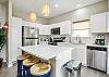 Kitchen Island with barstools perfect for entertaining 