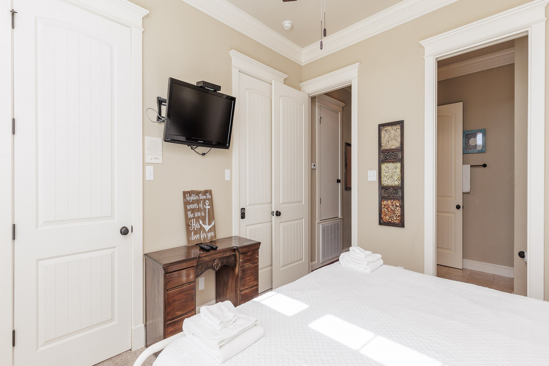 Third bedroom on the third floor with king size bed and flat screen TV