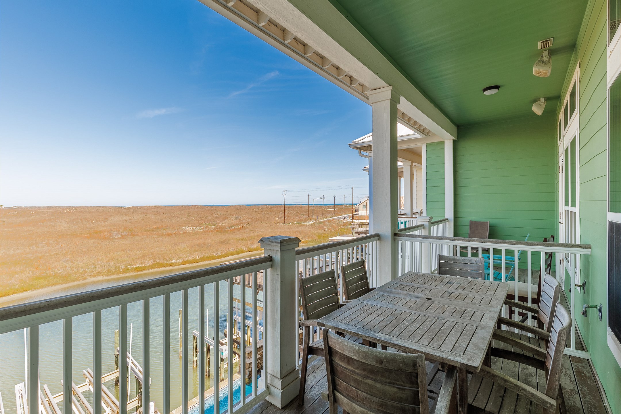 Third floor, private balcony with table and chairs overlooking the canal 