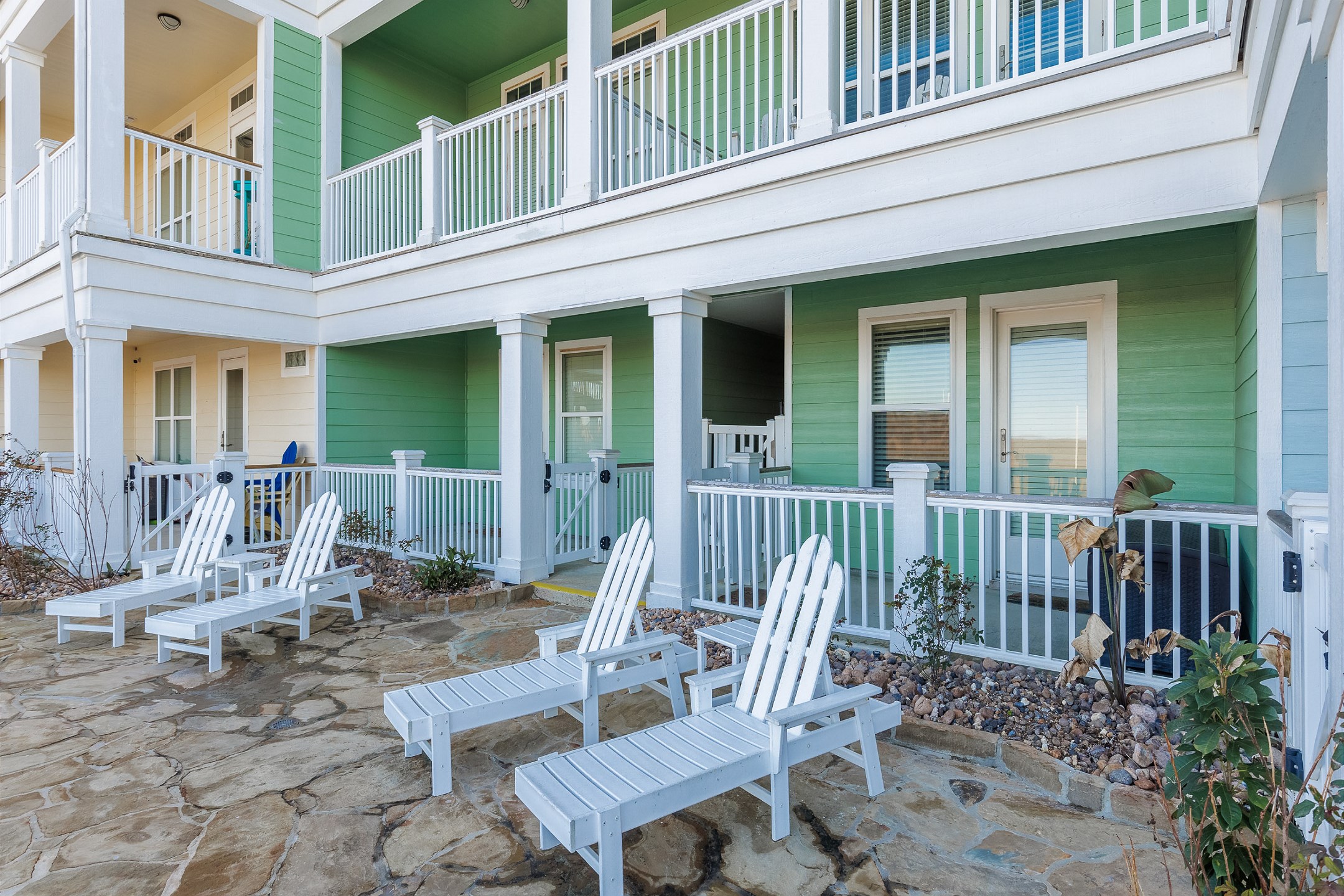 Easy access to the pool area with lounge chairs 