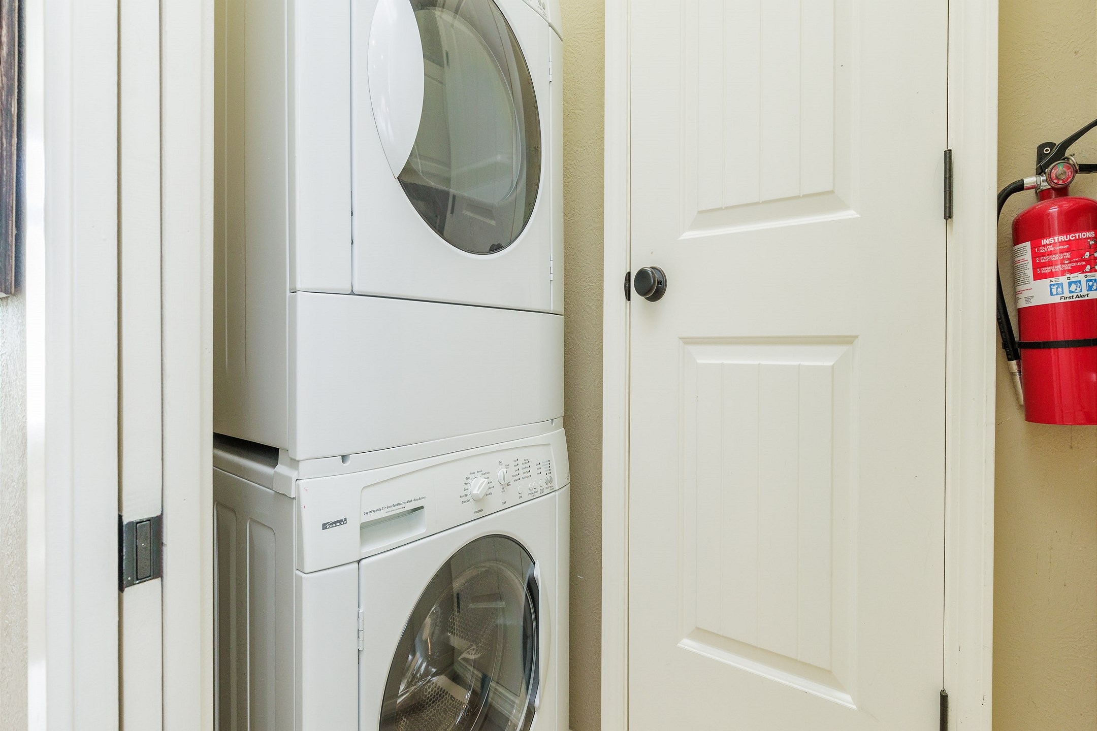 Conveniently located off the kitchen, this washer and dryer make vacation laundry a breeze