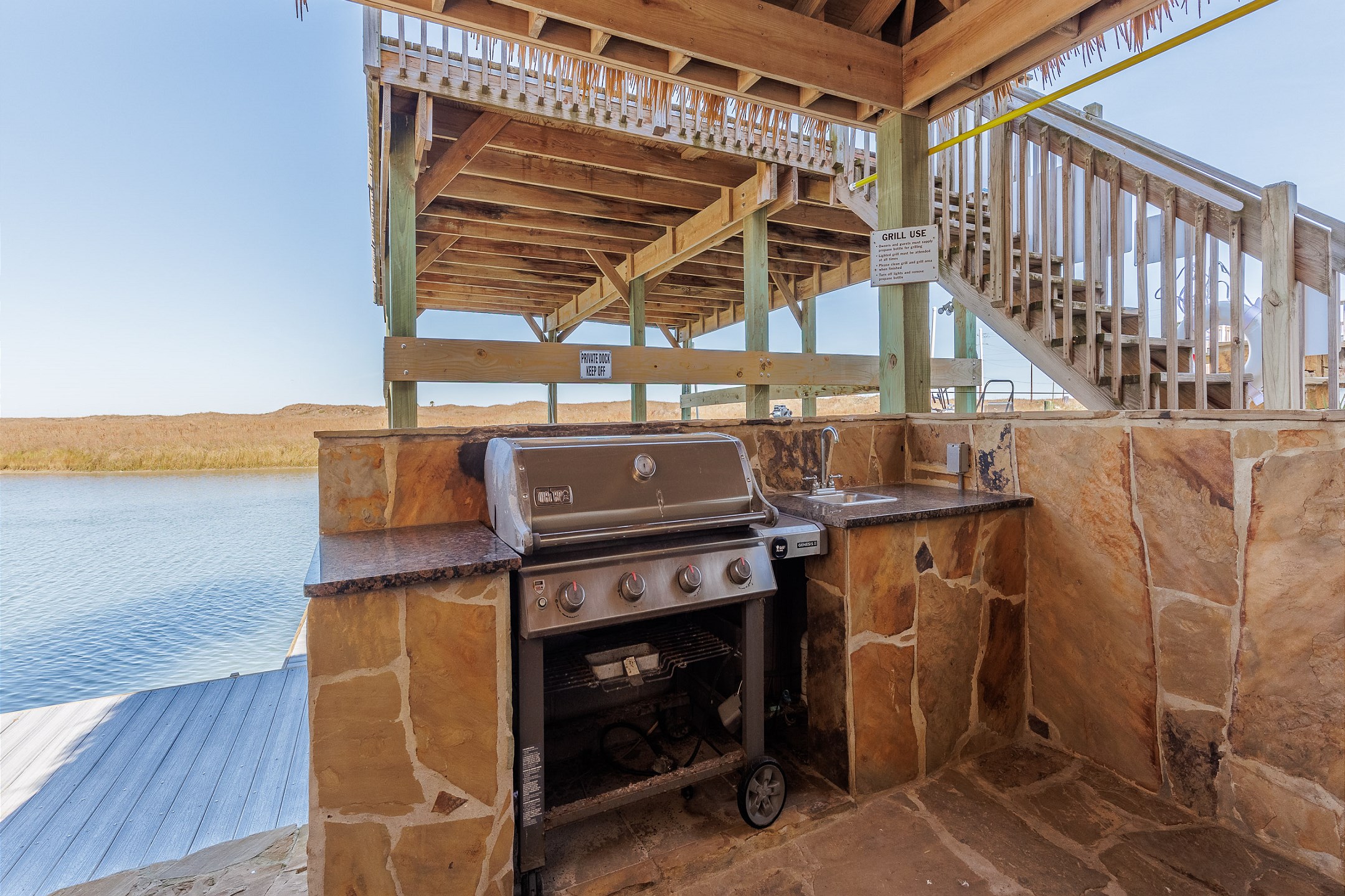 Propane grill available, off the pool area with canal views 