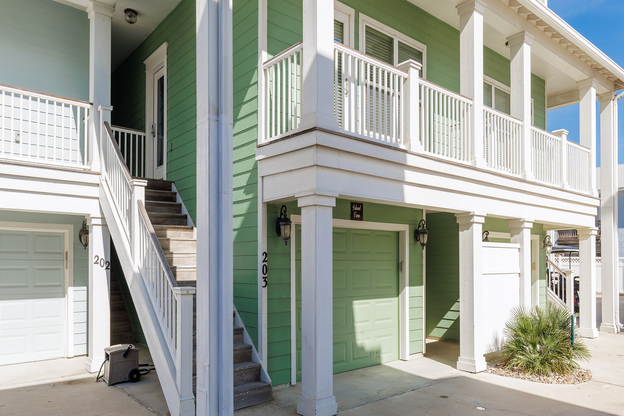 Front view of property with stairs to entrance 