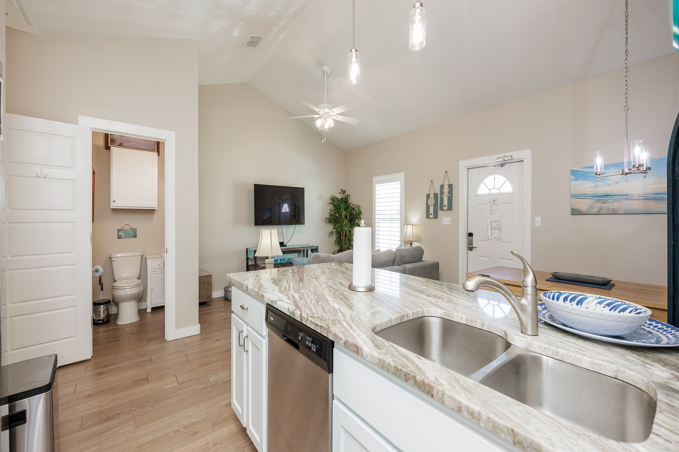 Spacious modern kitchen with luxurious granite countertops, perfect for preparing gourmet meals