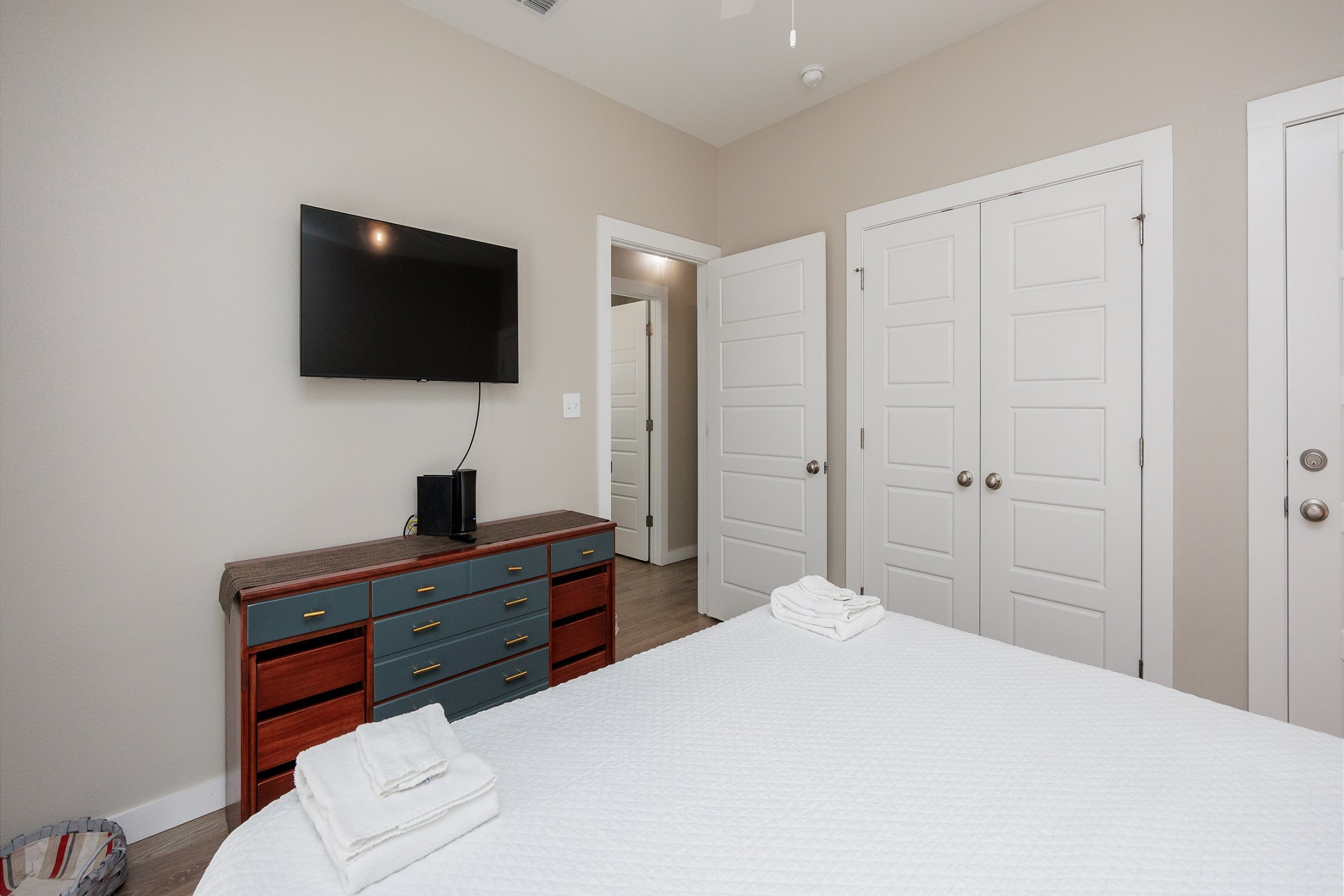 Escape to the Master Suite—King Bed, Patio & TV Bliss.