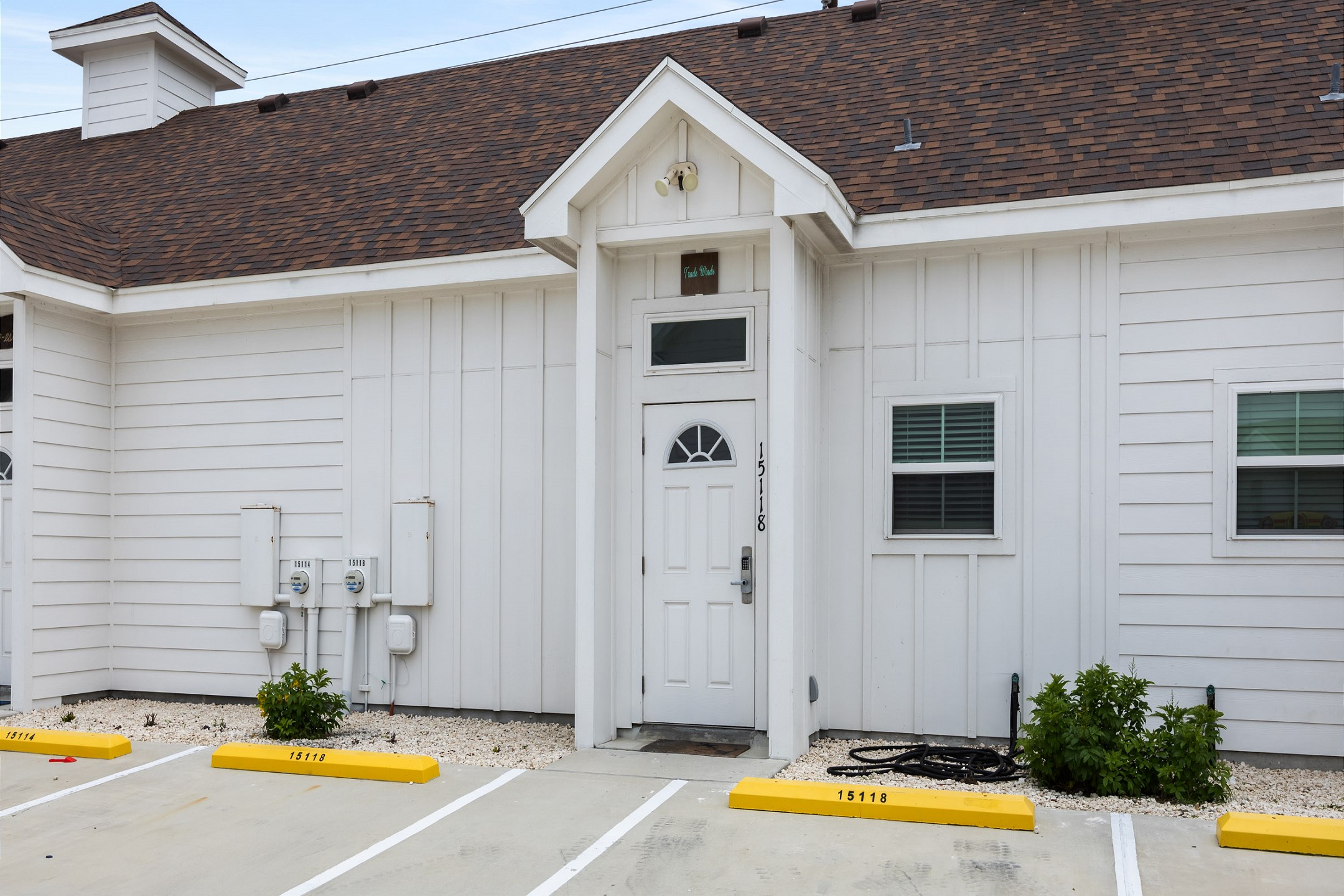 Front exterior of property, 2 reserved parking spots right our front 