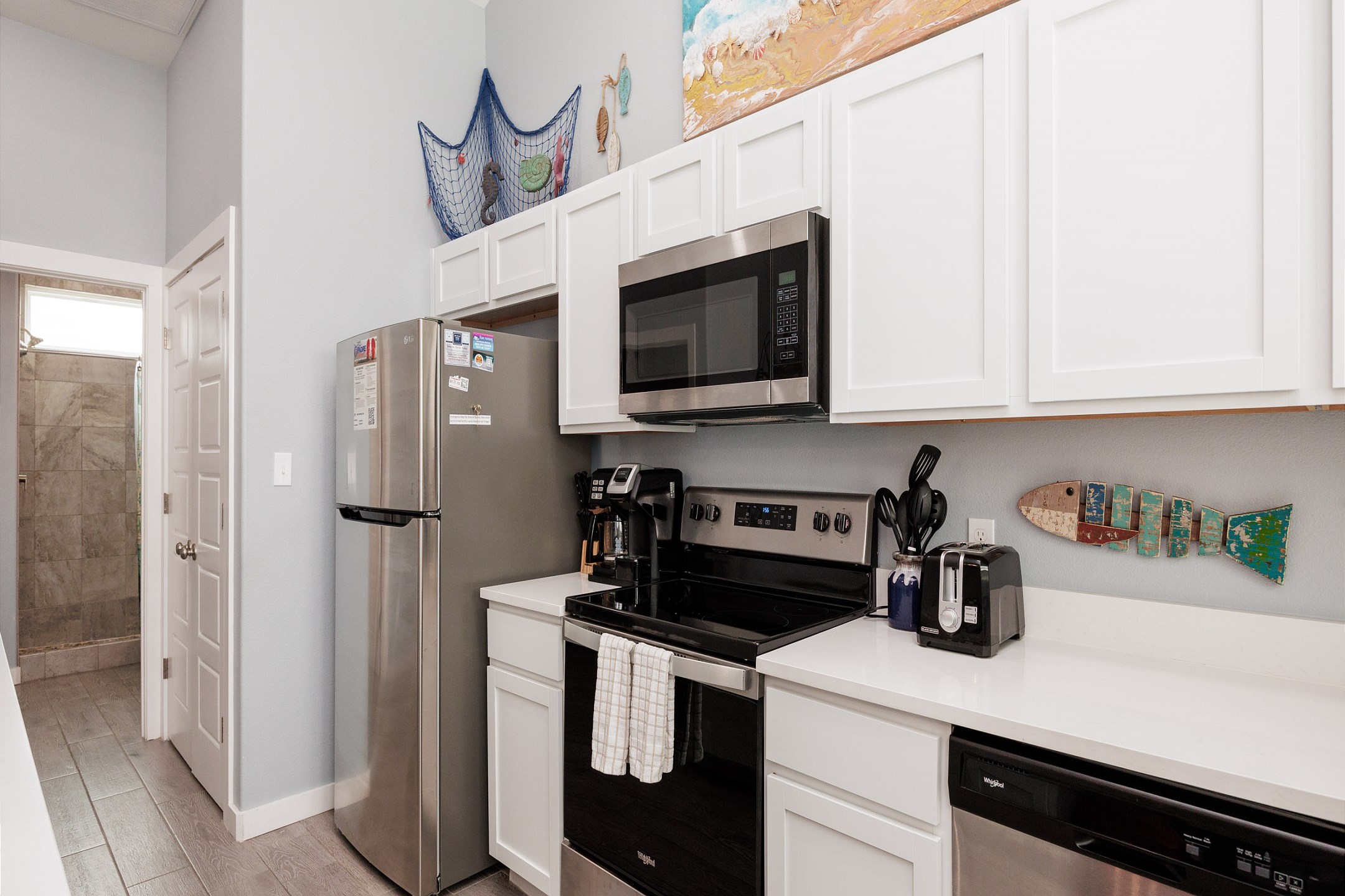 Cookware, utensils, and dinnerware available for guest use