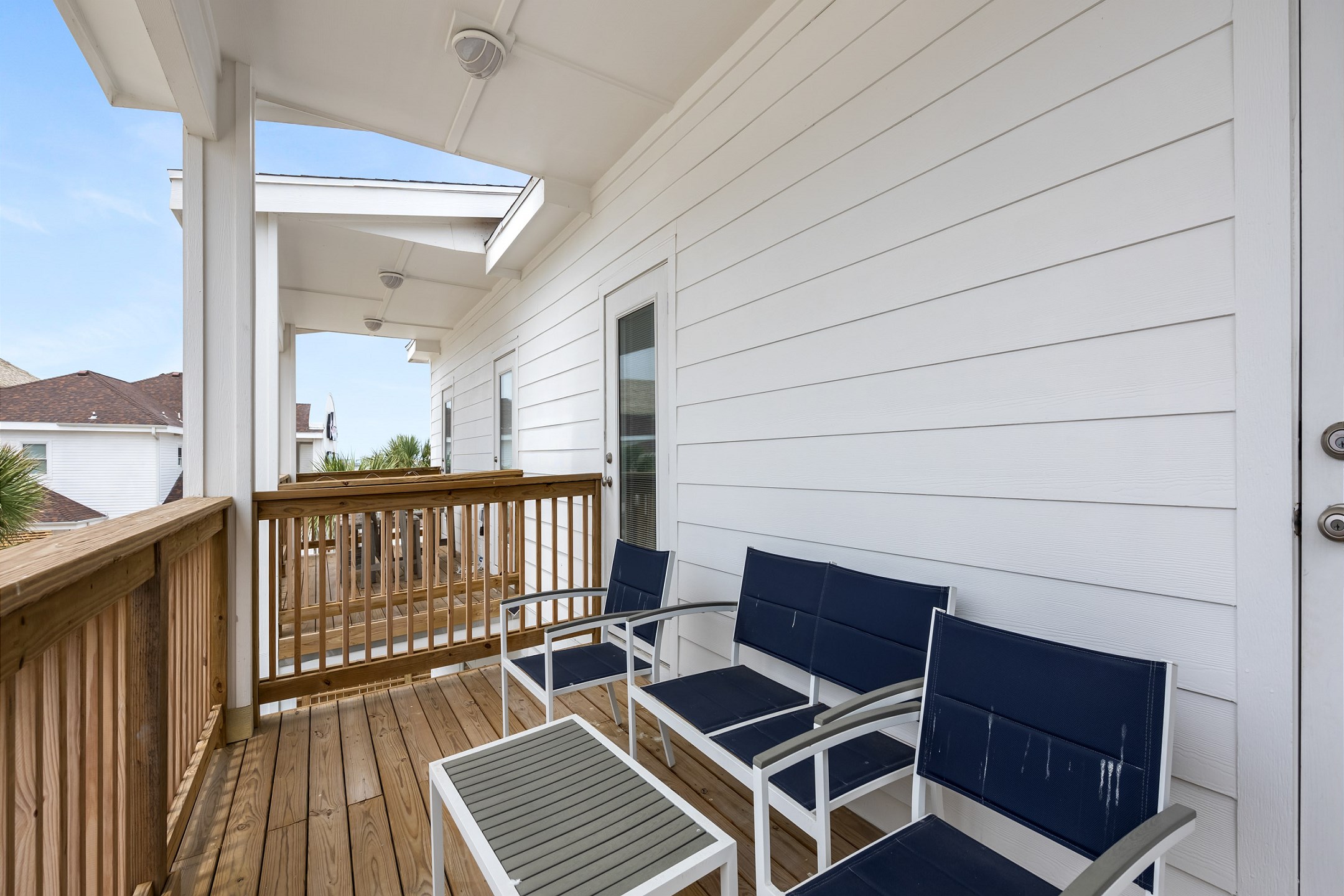 Private balcony off of the master bedroom with cozy chairs