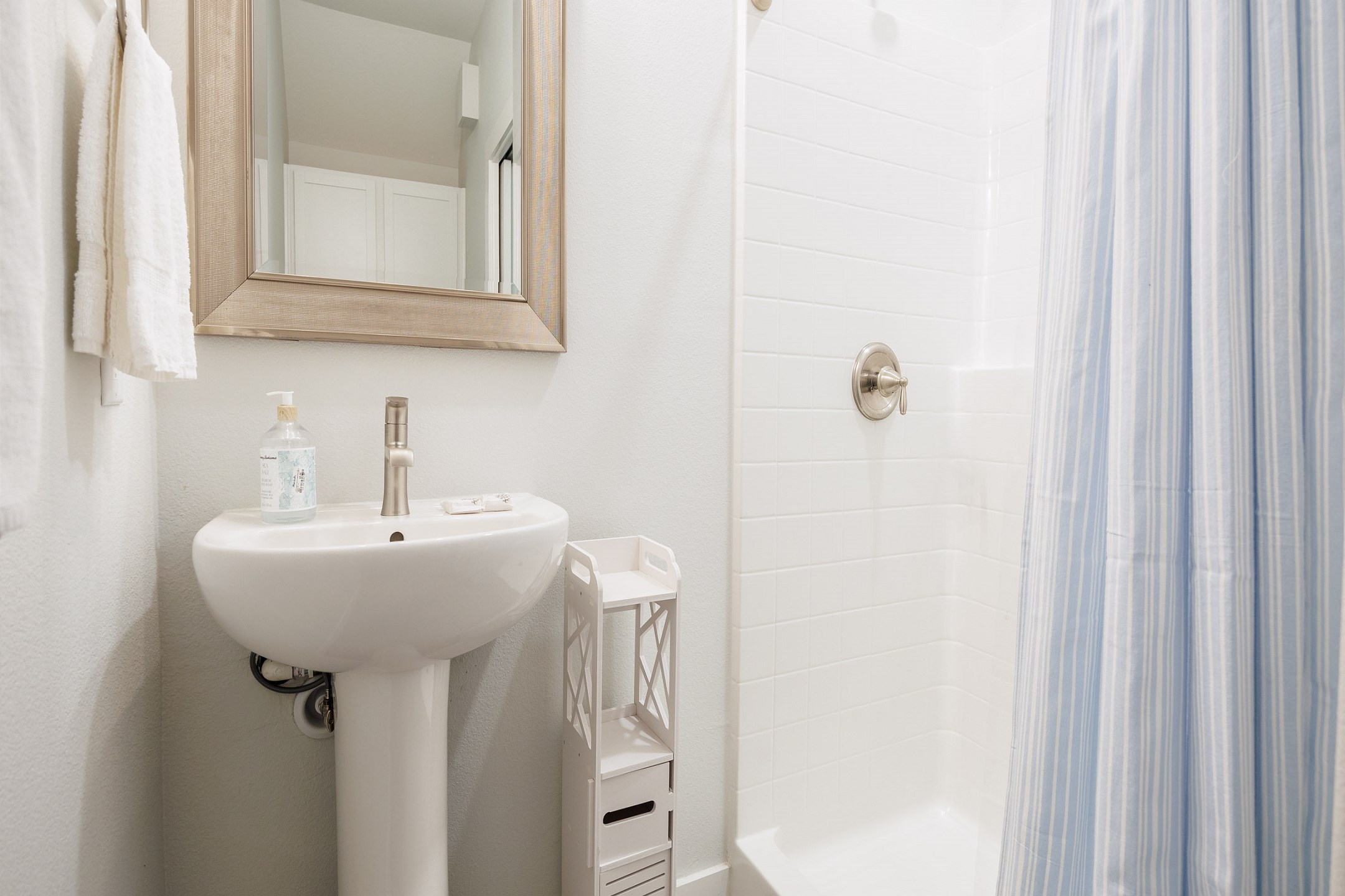 Guest bathroom on the first floor with a walk in shower 