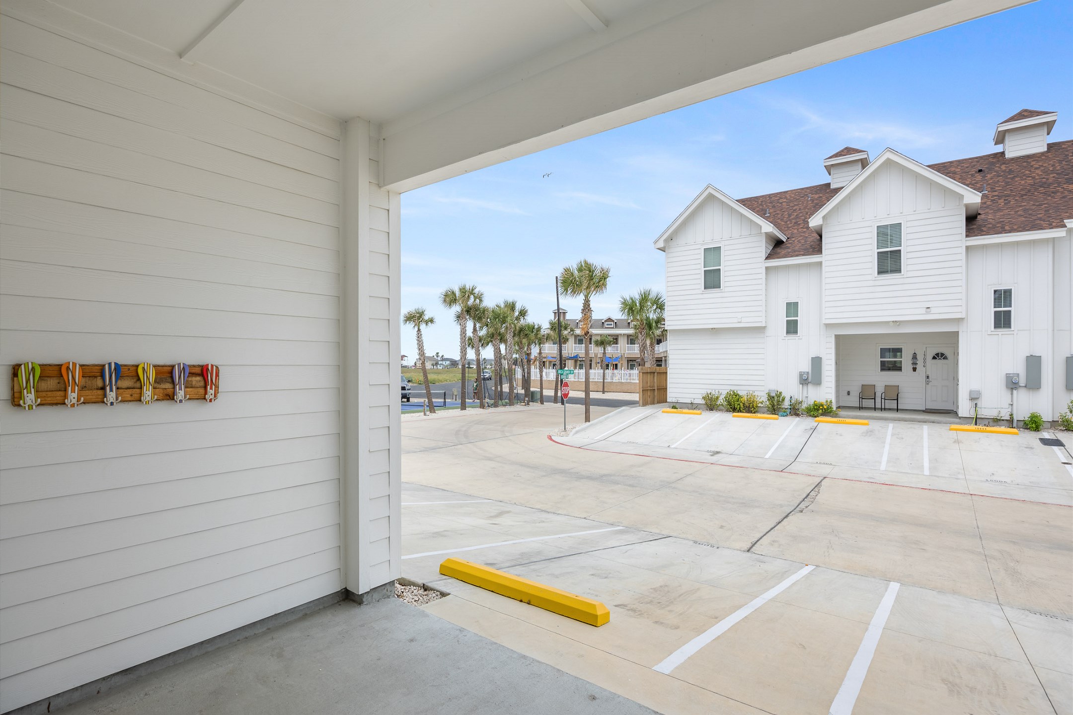 Front entryway and two reserved parking spots, additional guest parking available