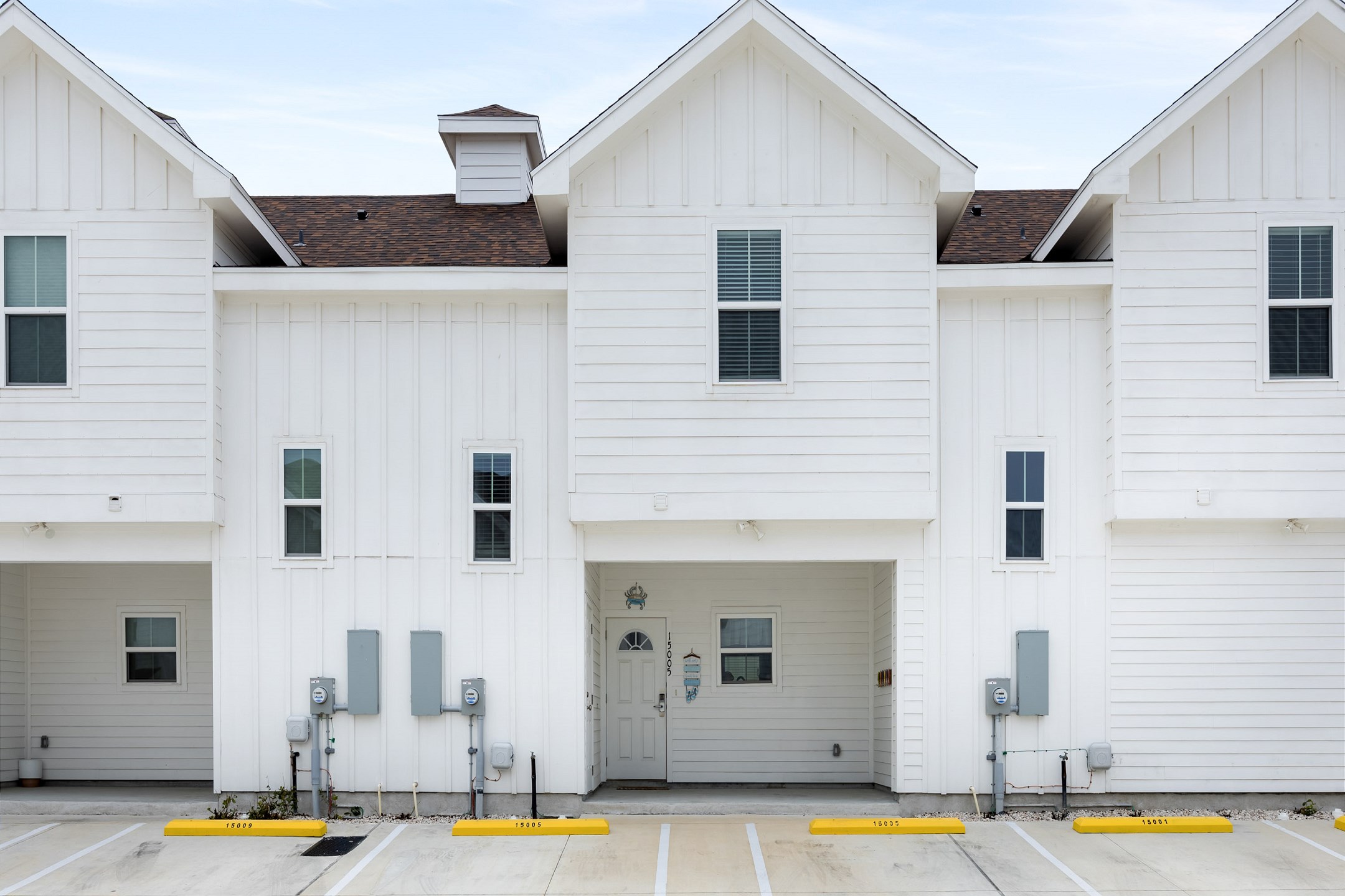 Front entryway and two reserved parking spaces right out front