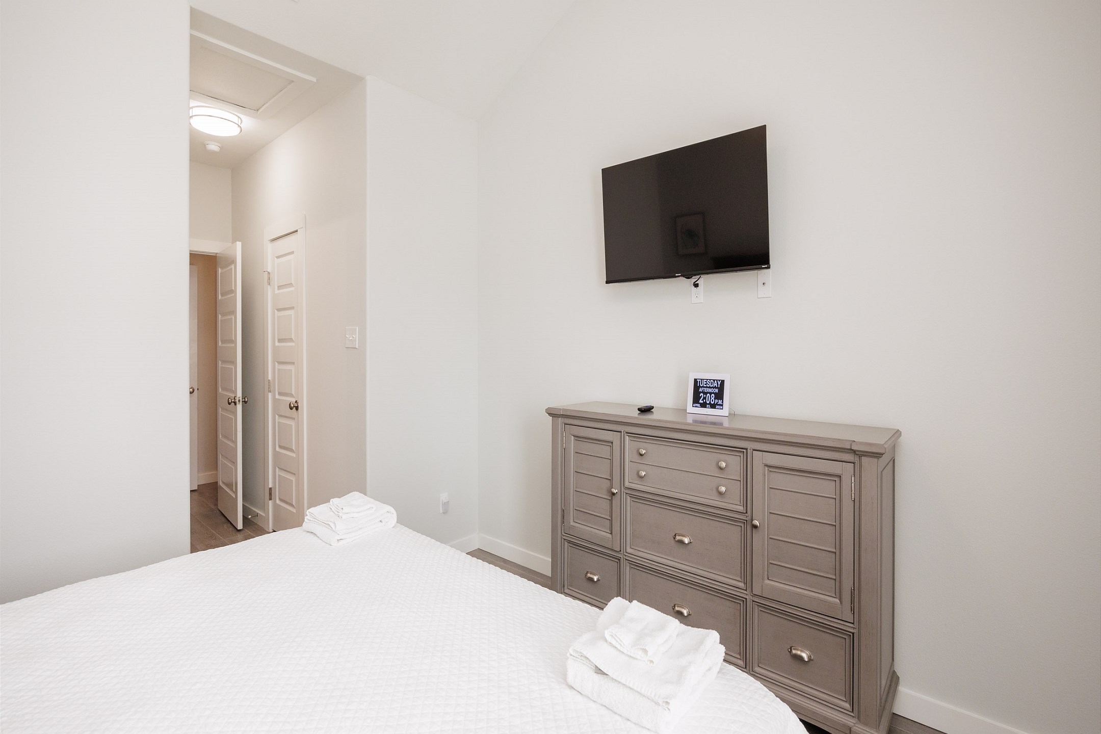 Master bedroom on the second floor with king size bed, private balcony, private bathroom and flat screen TV