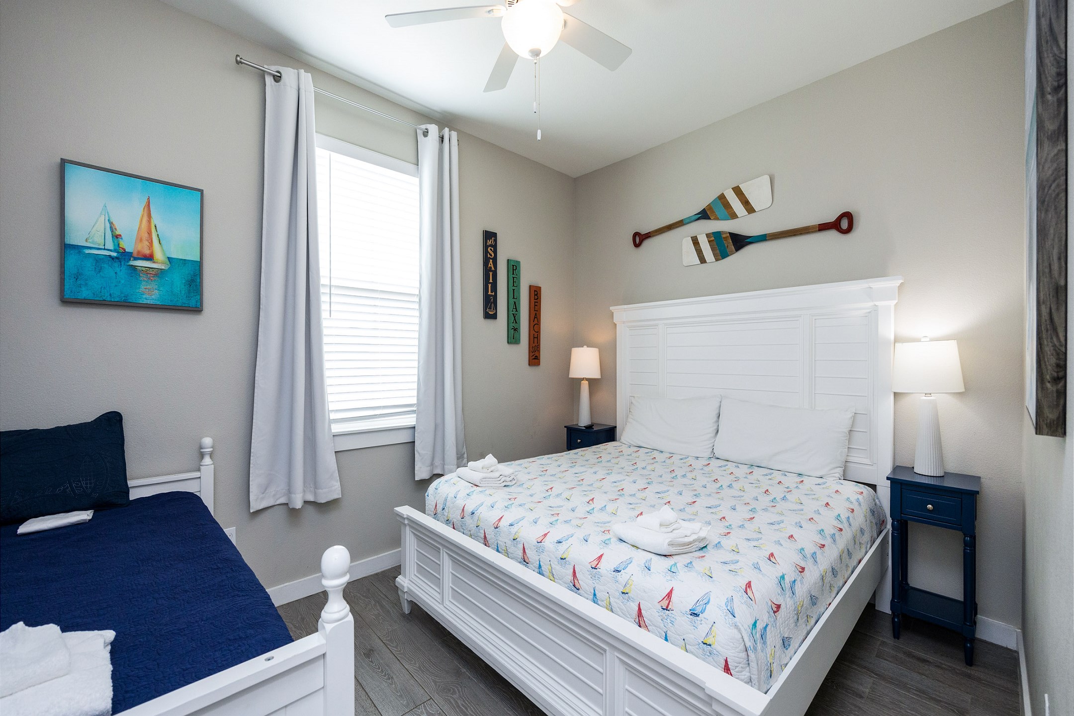 Second bedroom on the second floor with king size bed, twin daybed, with twin trundle, along with a flat screen TV 