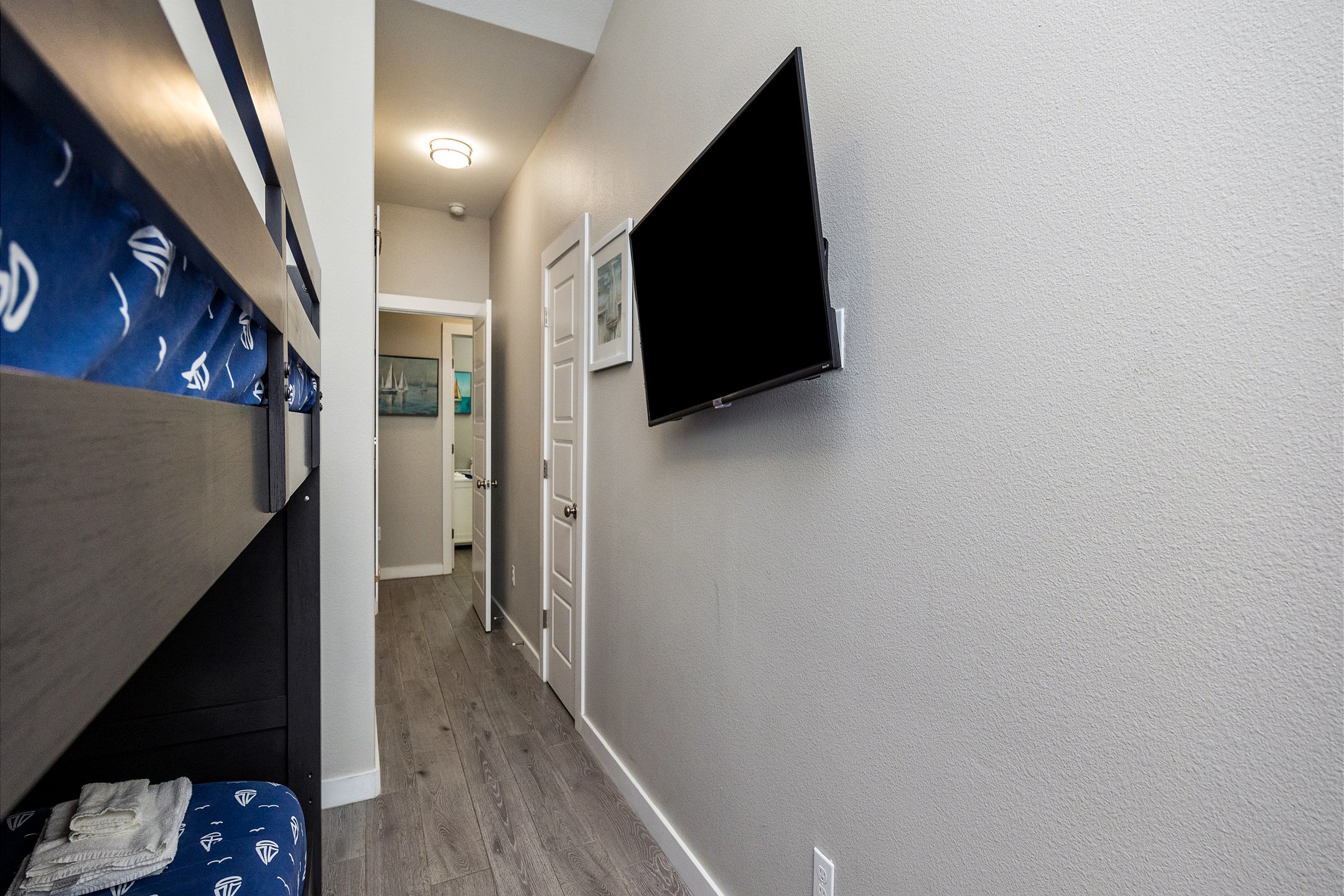 Third bedroom on the second floor with full over full size bunk beds and flat screen TV 