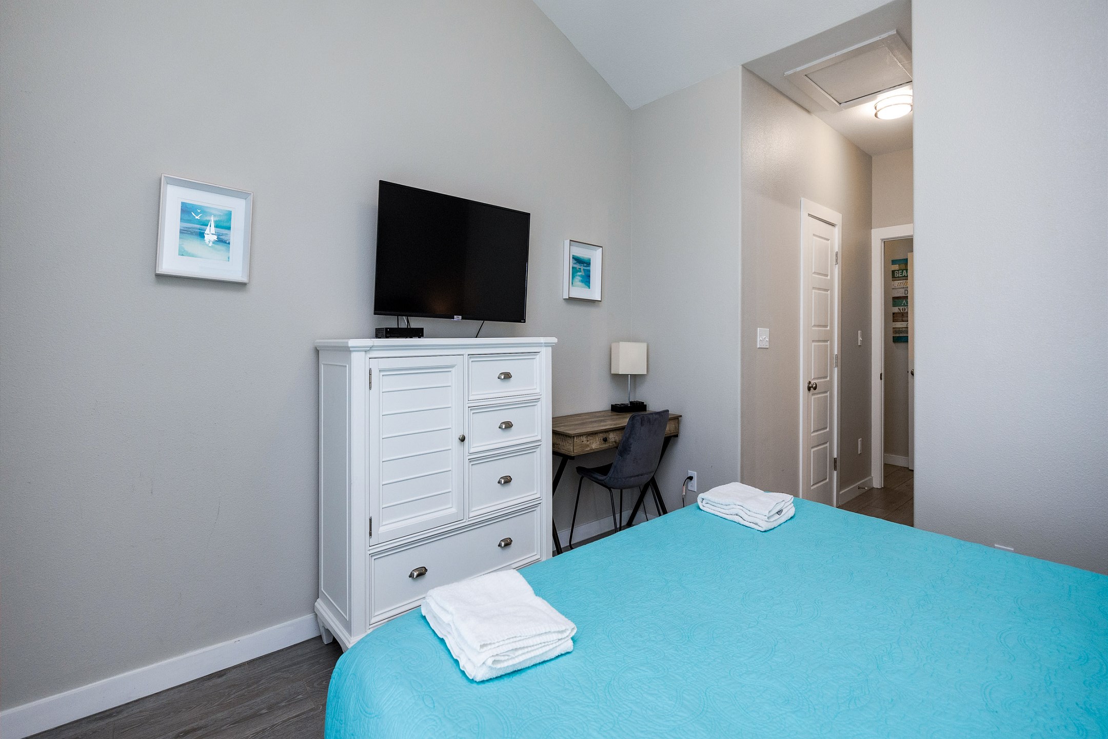 Master bedroom on the second floor with king size bed, private bathroom, private balcony and flat screen TV