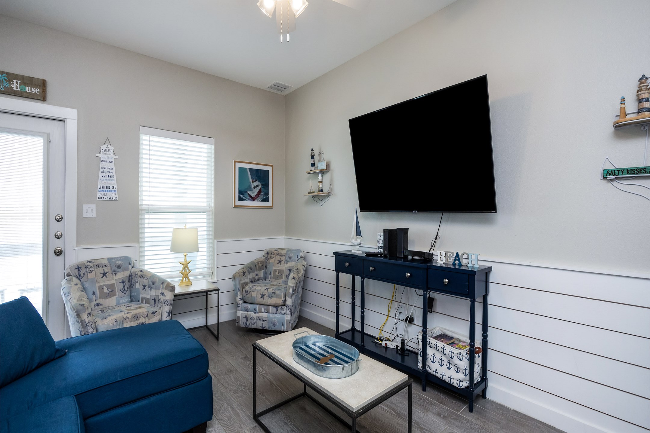 Open-concept living space featuring contemporary furnishings and bathed in natural light