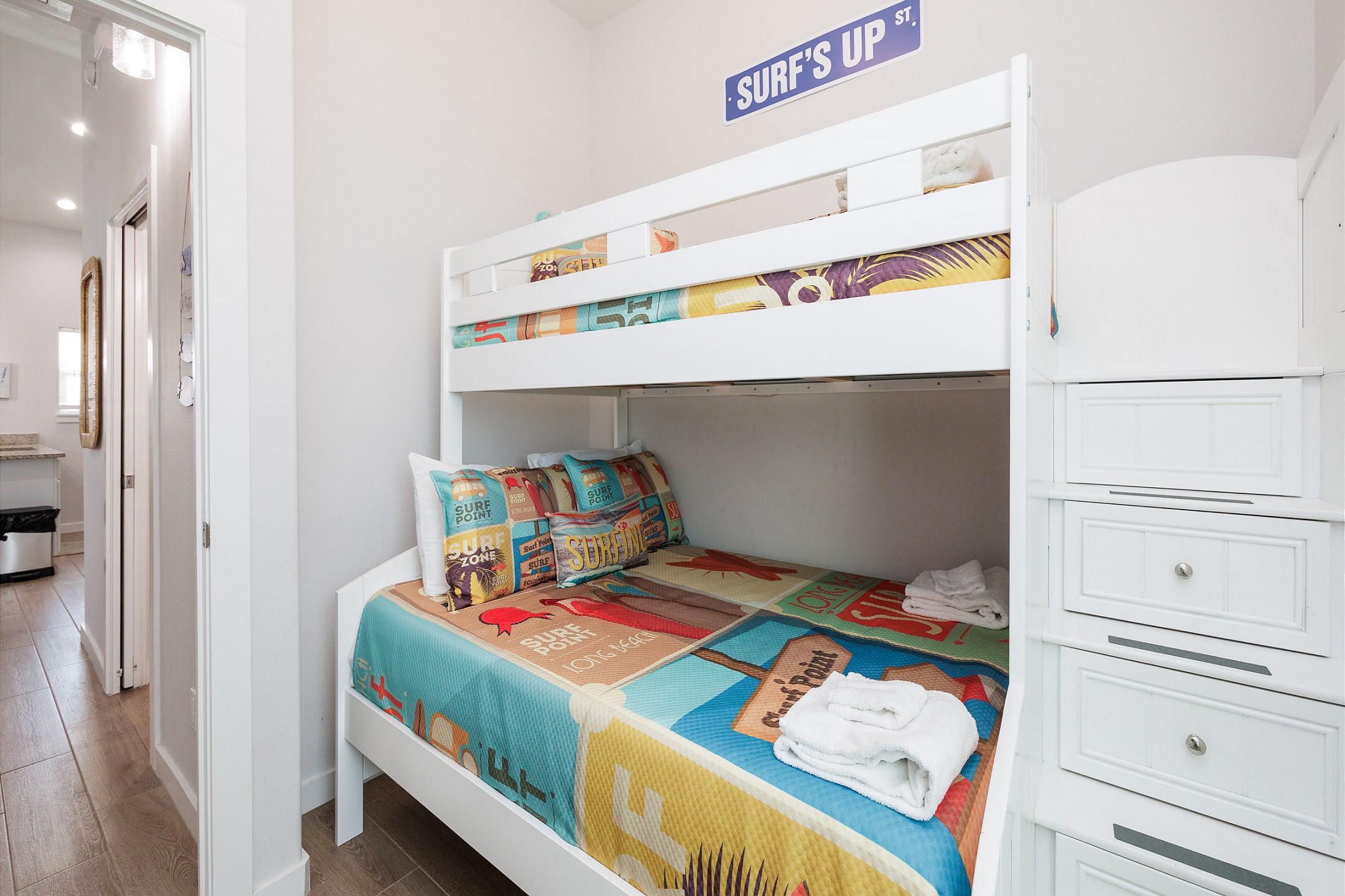 Second bedroom with twin over full bunk bed and flat screen TV 