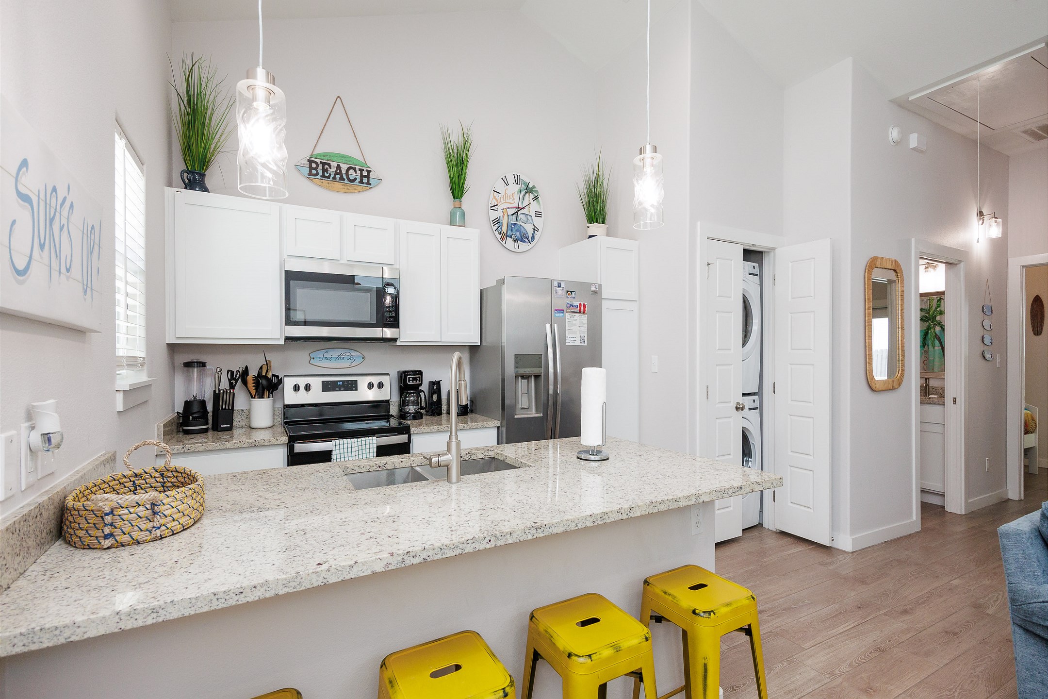 Bright kitchen Island with four barstools, perfect for entertaining 