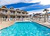 The second pool, at Arubaduex just across the street, features a splash pad and comfortable loungers 