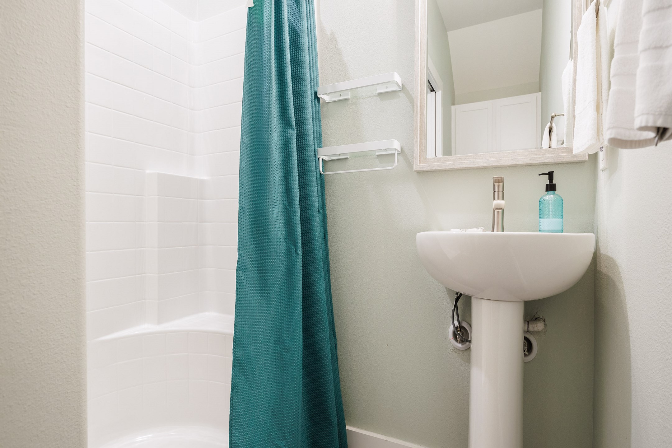 Guest bathroom on the first floor with walk in shower 