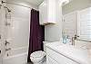 Guest bathroom on the second floor with tub/shower combo