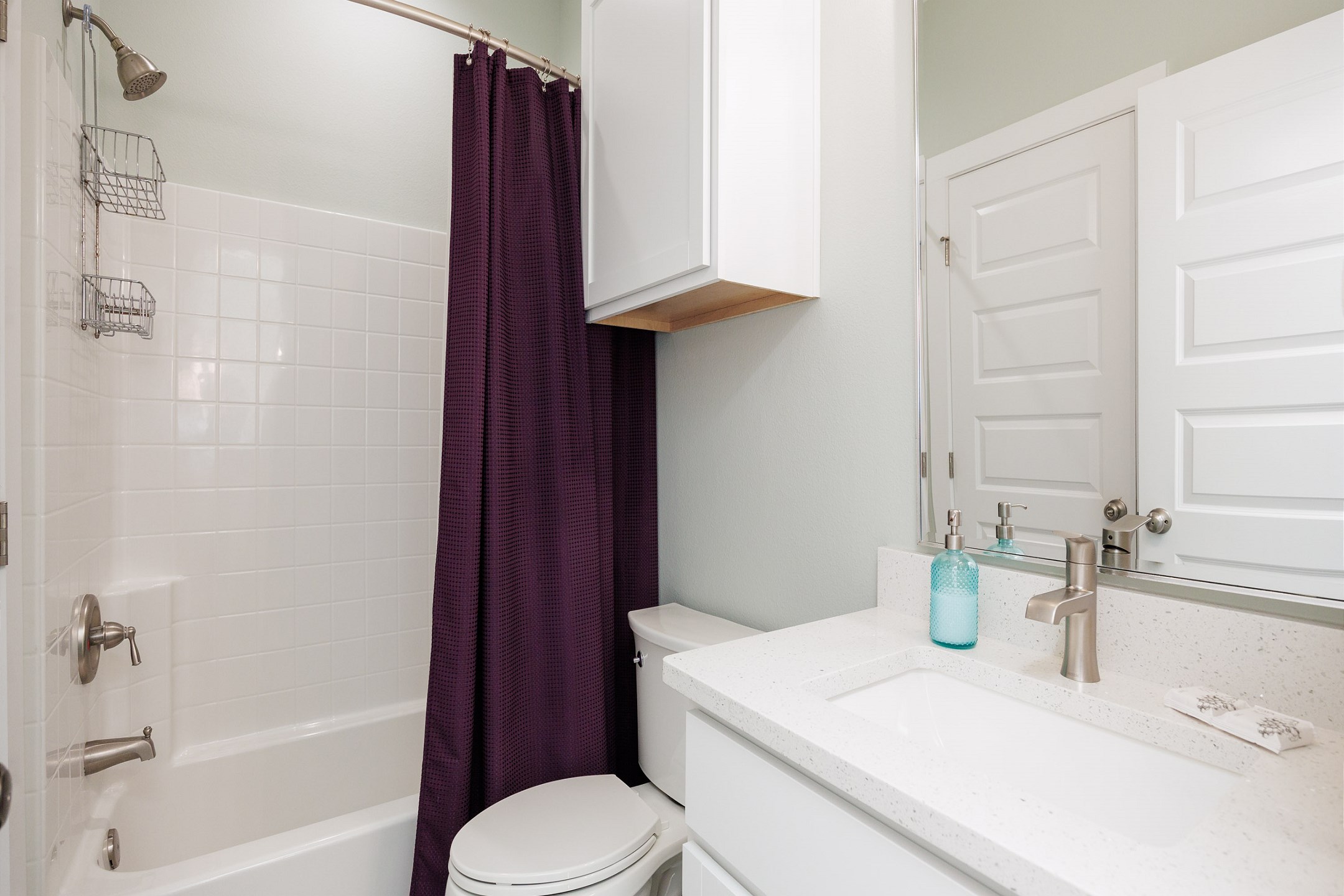 Guest bathroom on the second floor with tub/shower combo
