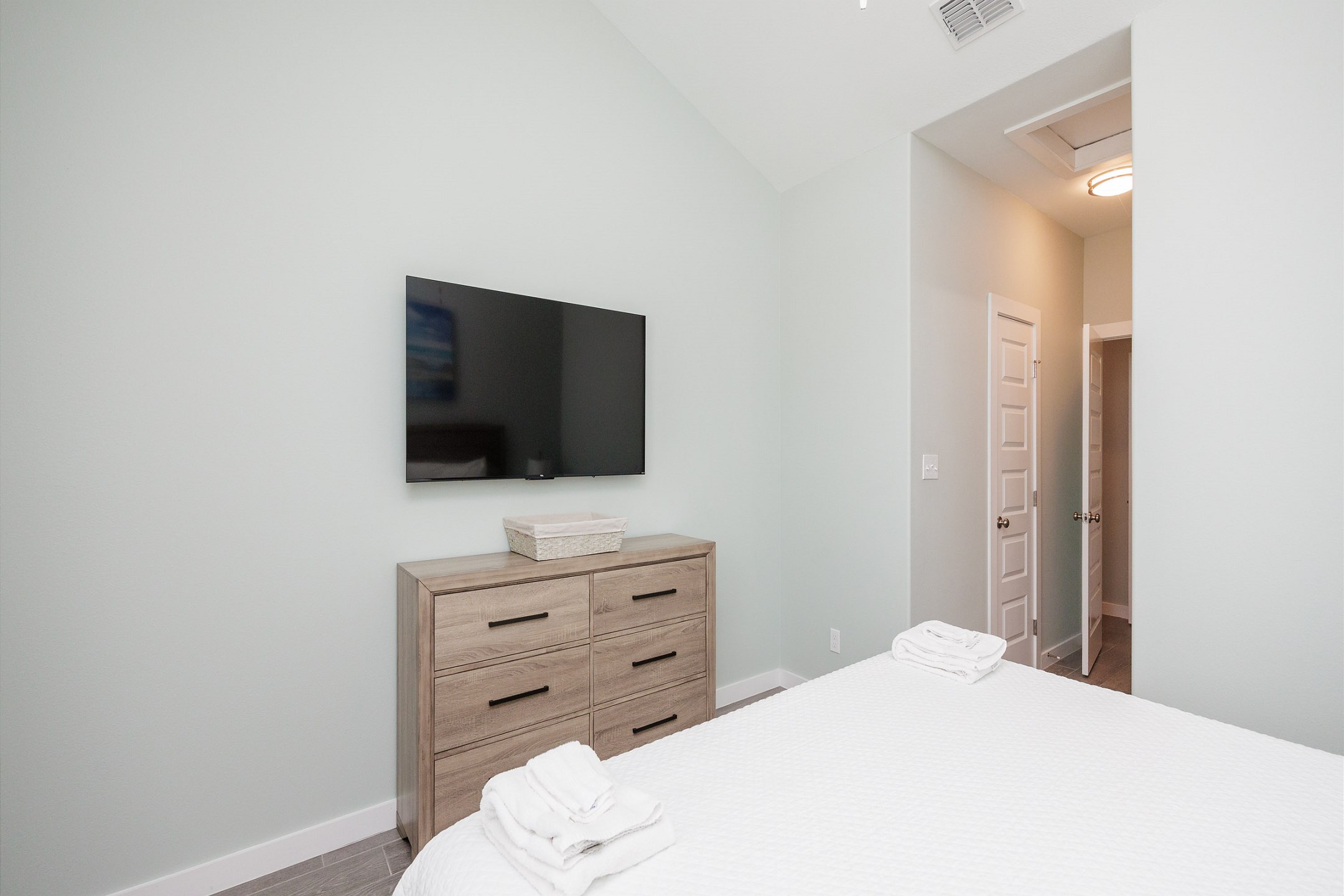 Master bedroom on the second floor with king size bed, ensuite bathroom and flat screen TV