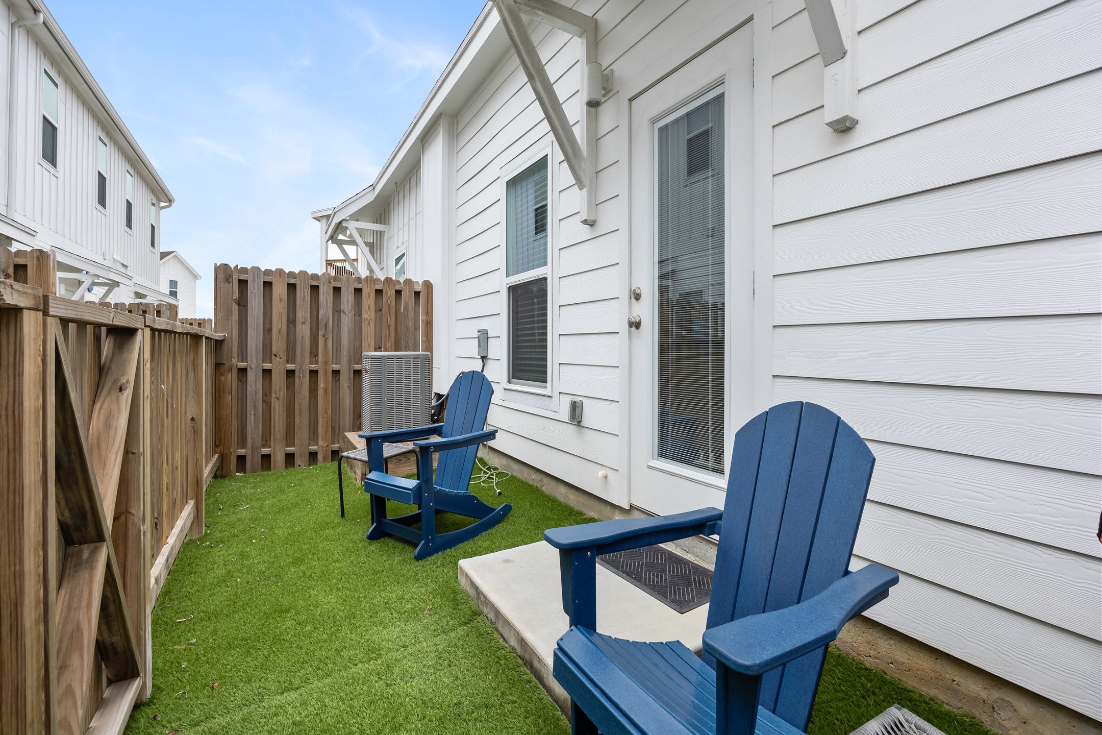 Private patio off the master bedroom with chairs