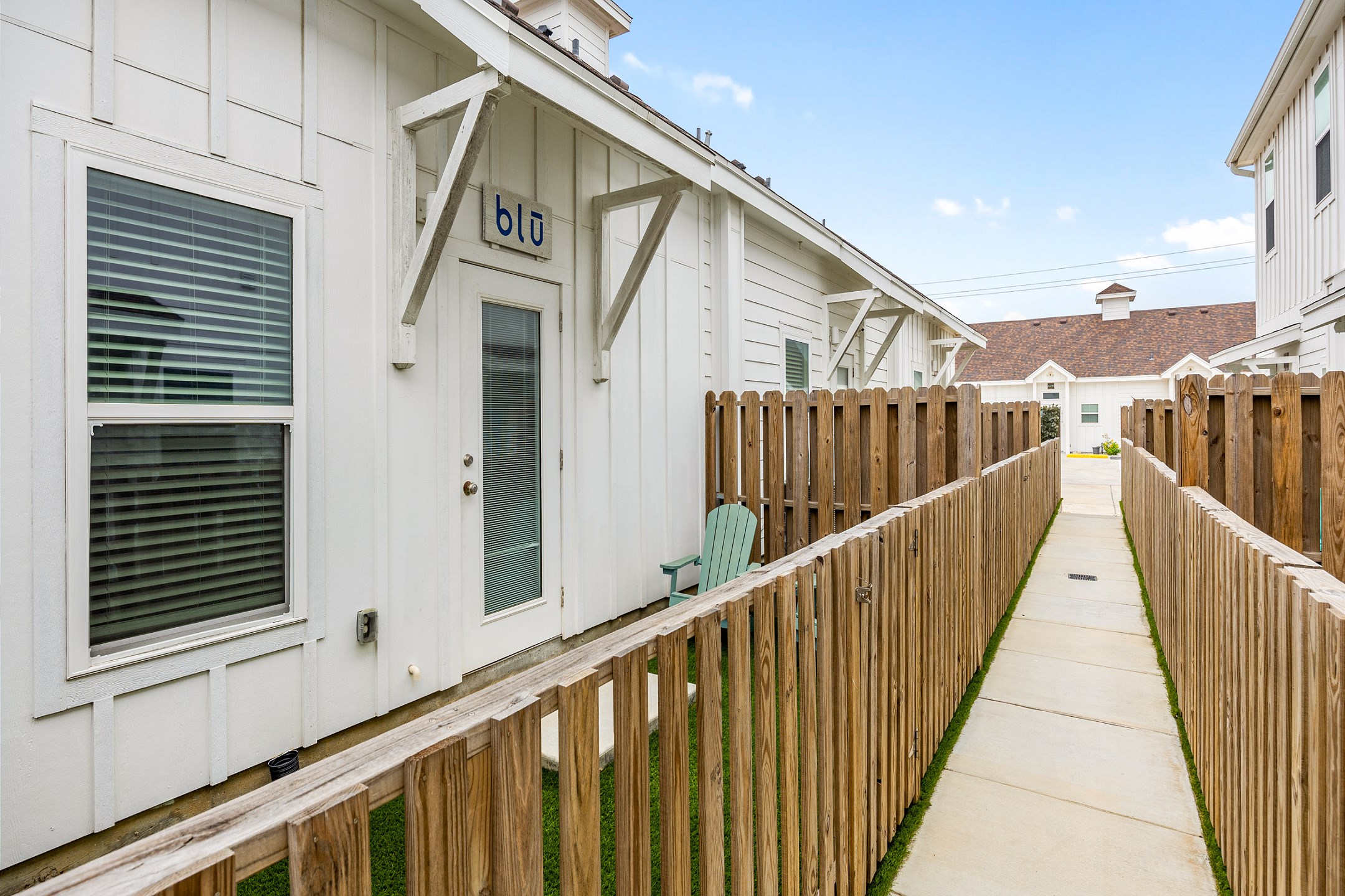 Back pathway to parking/pool 