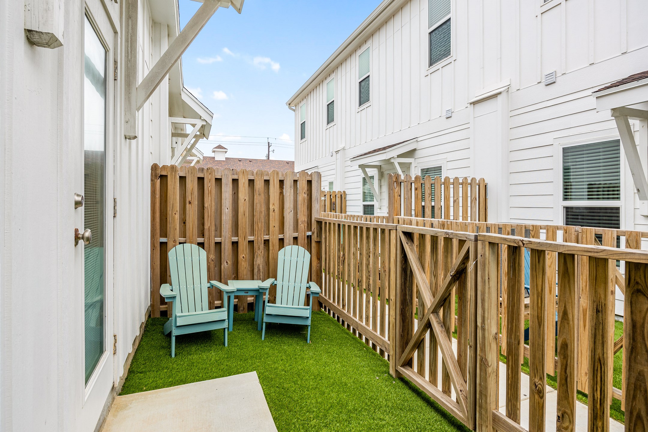 Enjoy the Texas breeze on this private turf patio 
