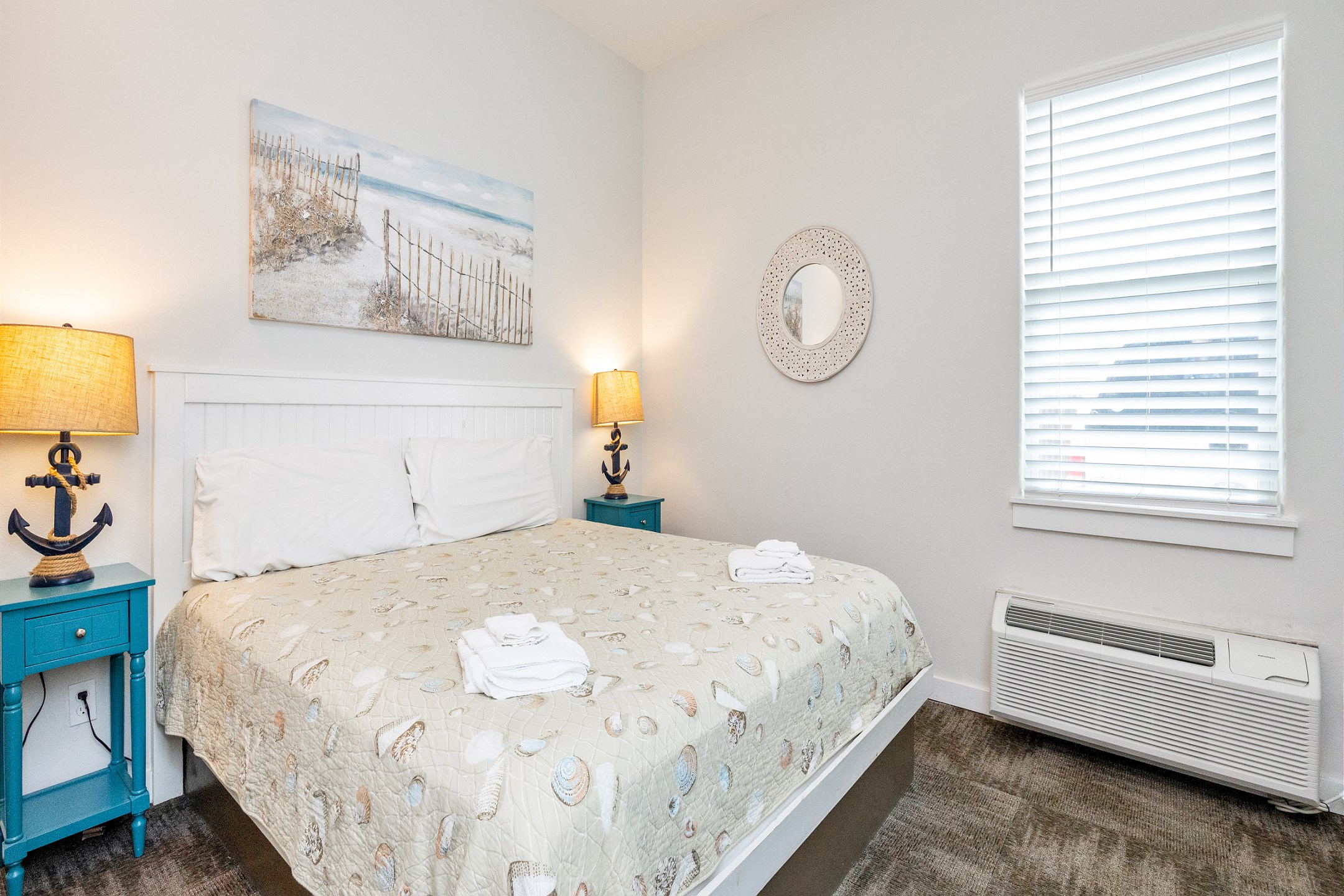 Master bedroom with king size bed and flat screen TV