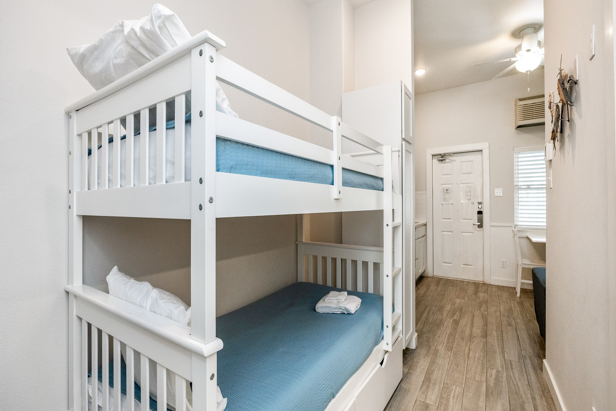 Twin bunk beds in the hallway nook