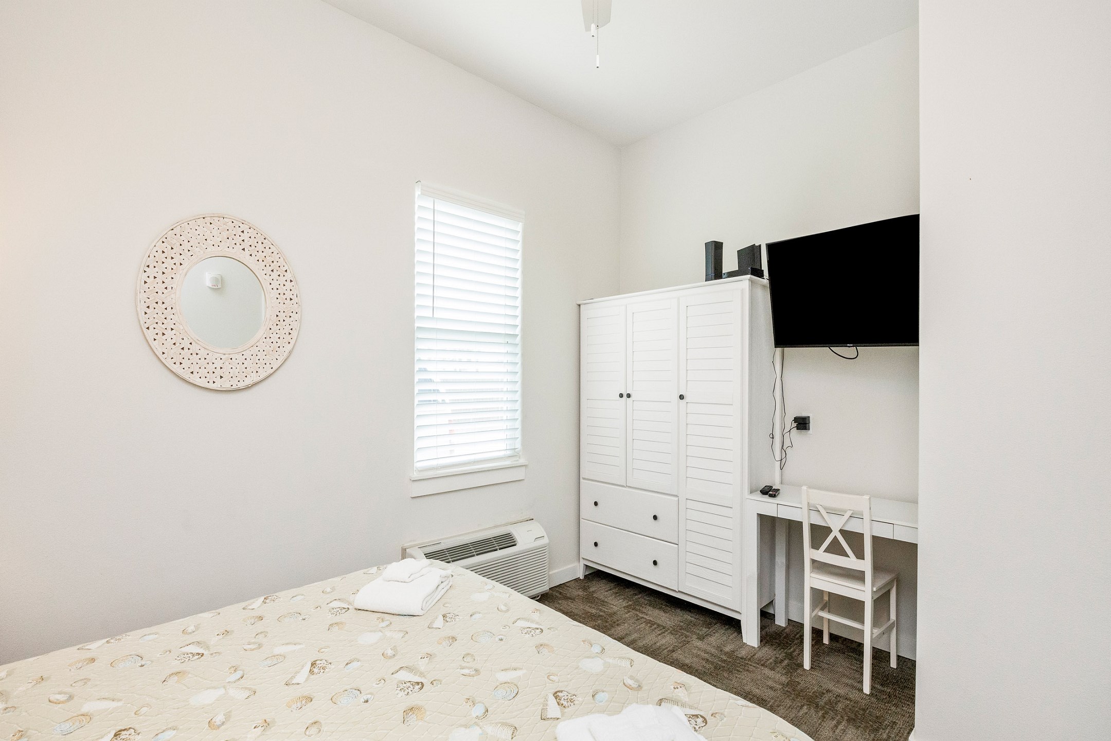 Master bedroom with king size bed and flat screen TV