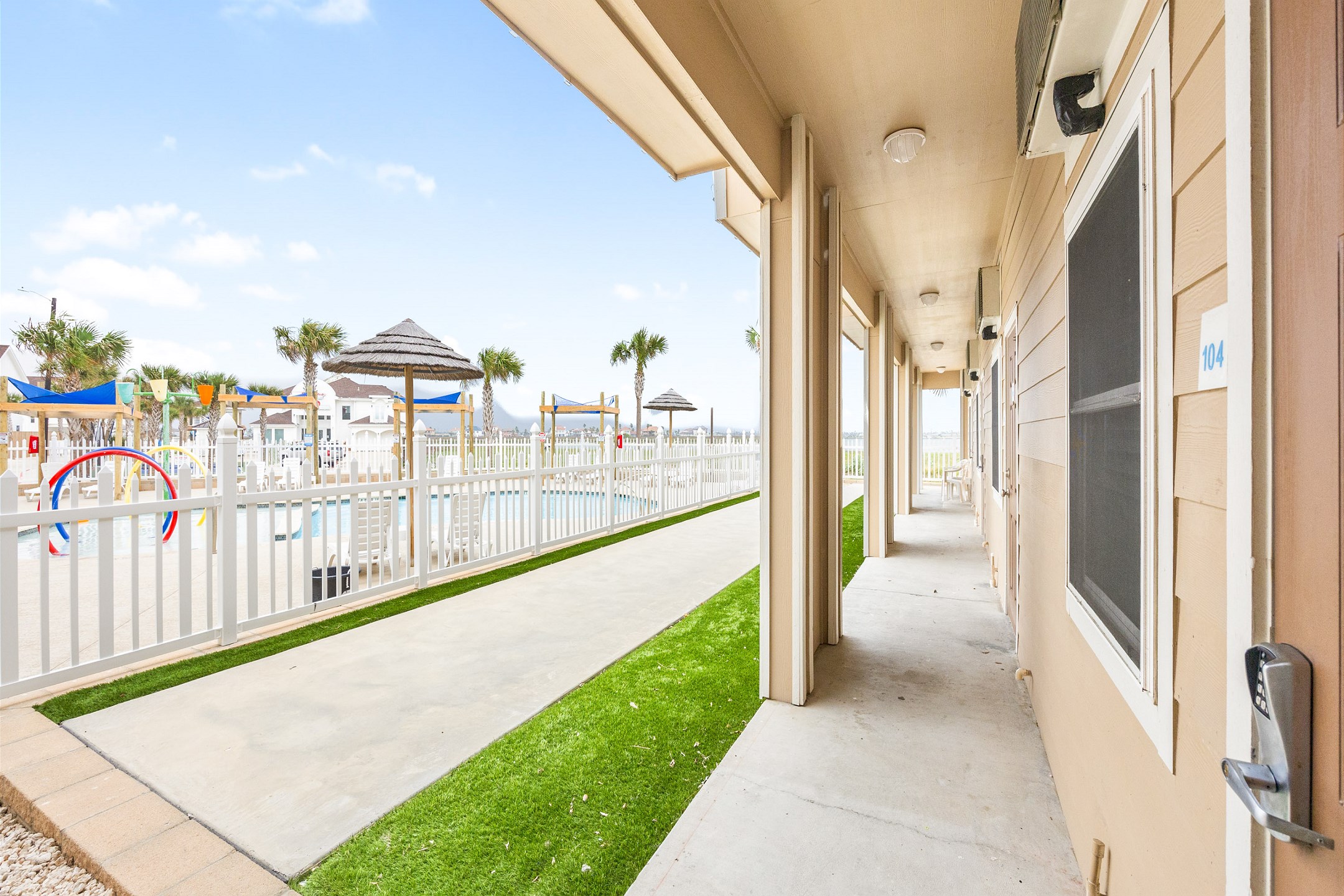 Front entrance to property with pool view 