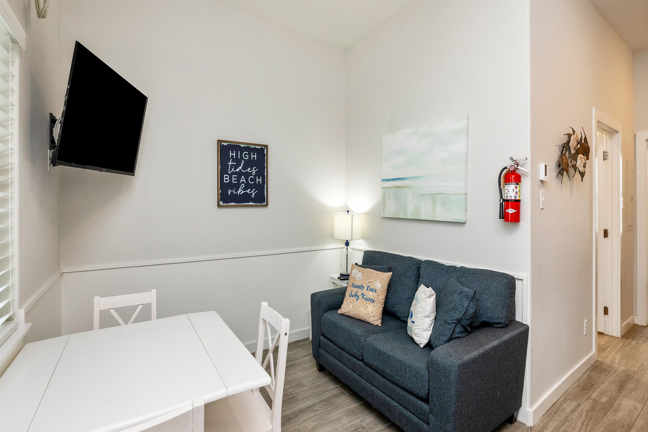 Living area with twin sleeper sofa and flat screen TV